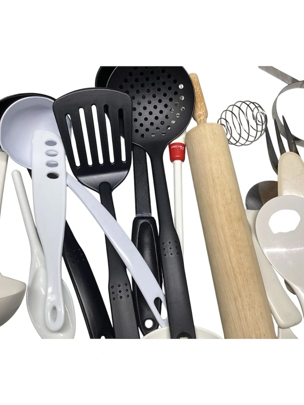 A little over 4 pounds of Assorted Kitchen Utensils